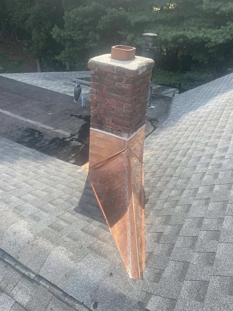 Slide of RJM Best Roofing