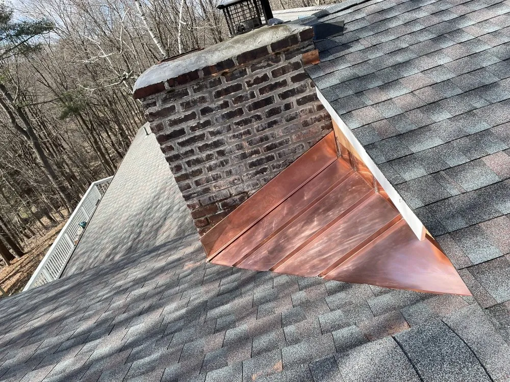 Slide of RJM Best Roofing
