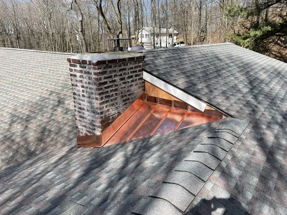 Slide of RJM Best Roofing