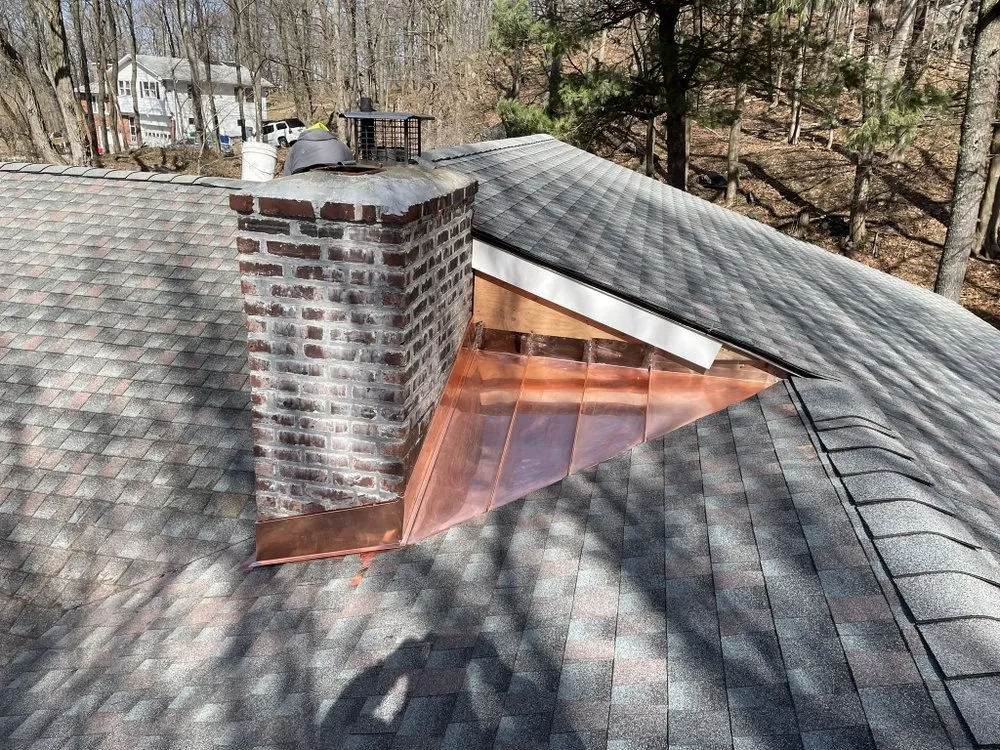 Slide of RJM Best Roofing