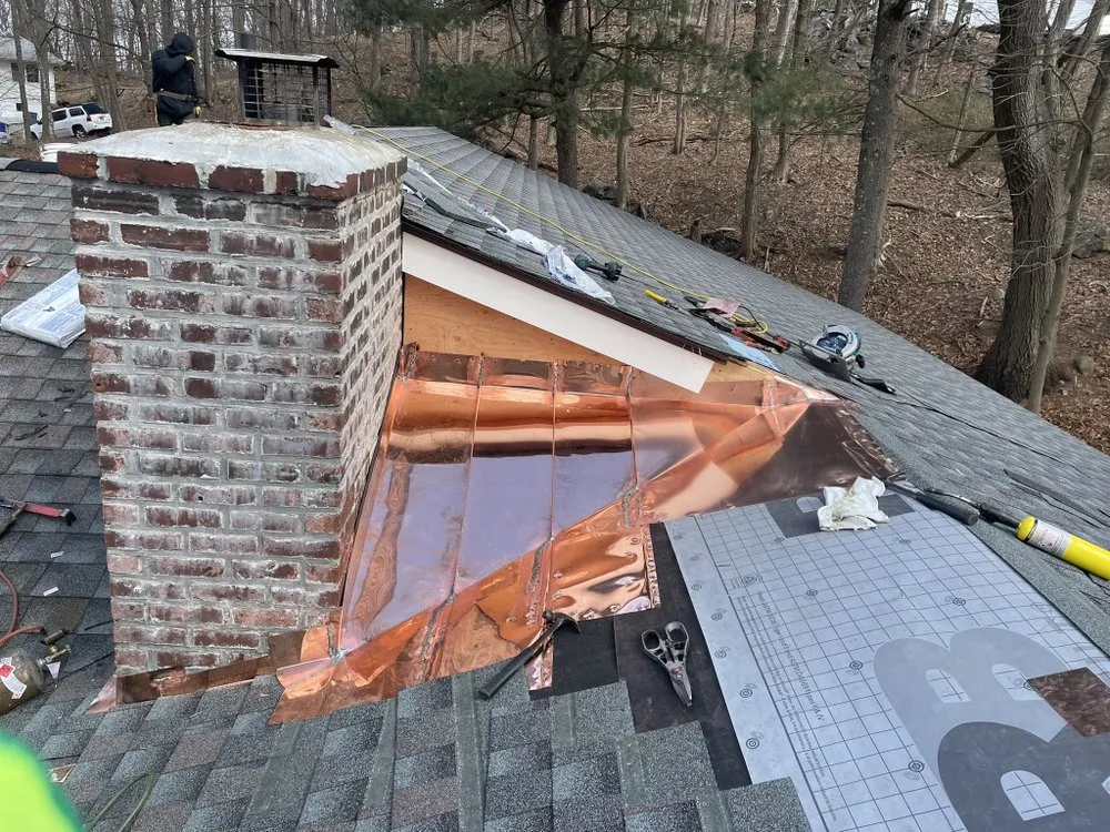 Slide of RJM Best Roofing