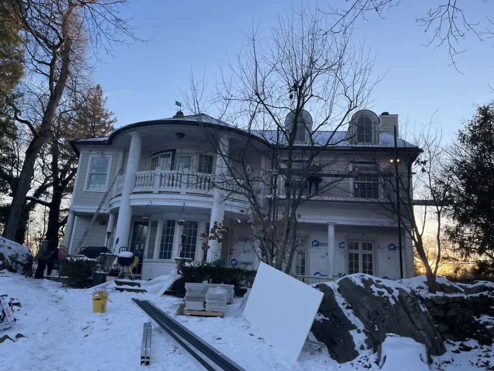 Slide of RJM Best Roofing