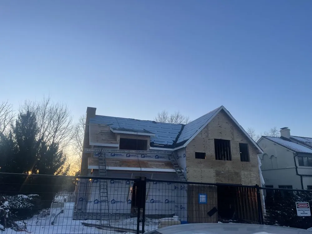 Slide of RJM Best Roofing