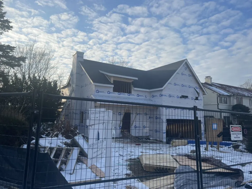 Slide of RJM Best Roofing