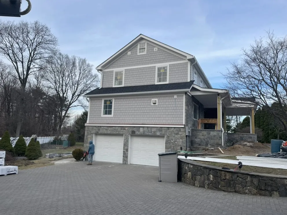 Slide of RJM Best Roofing