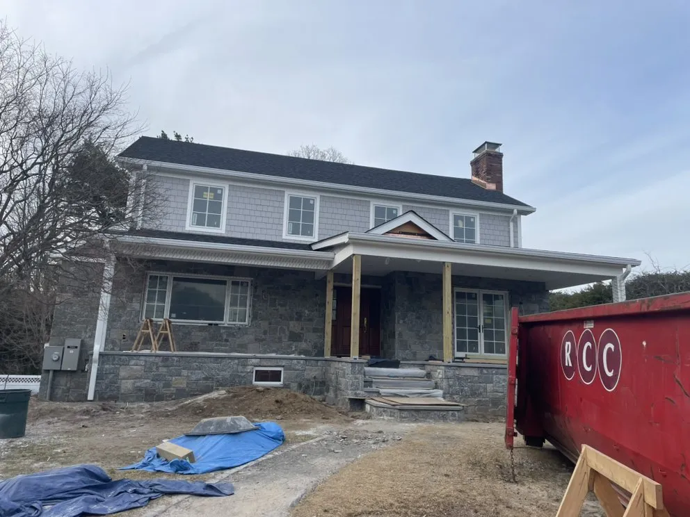 Slide of RJM Best Roofing