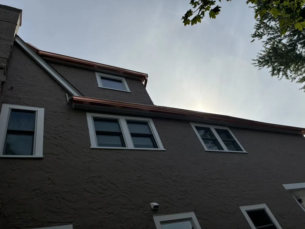 Slide of RJM Best Roofing