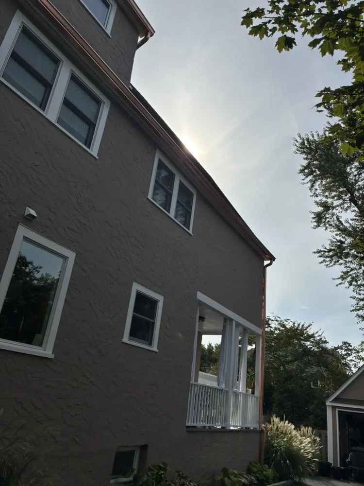 Slide of RJM Best Roofing