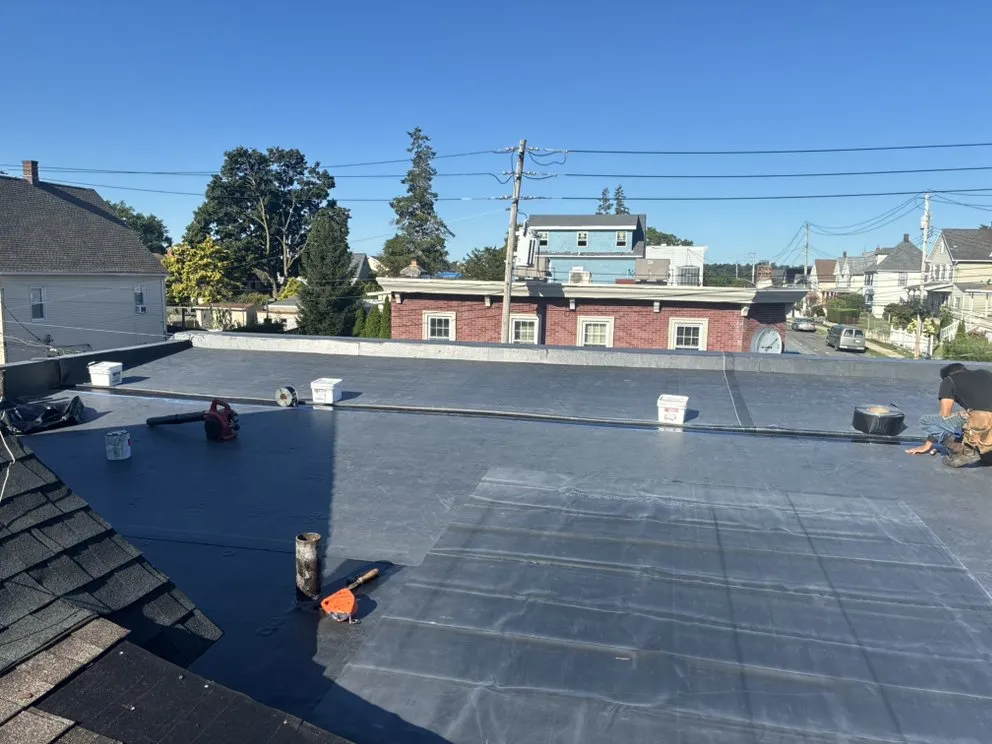 Slide of RJM Best Roofing