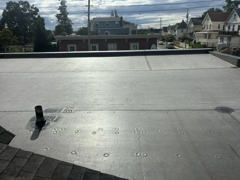 Slide of RJM Best Roofing