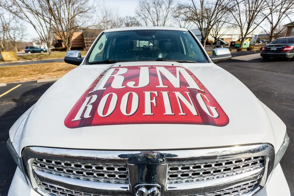 Slide of RJM Roofing