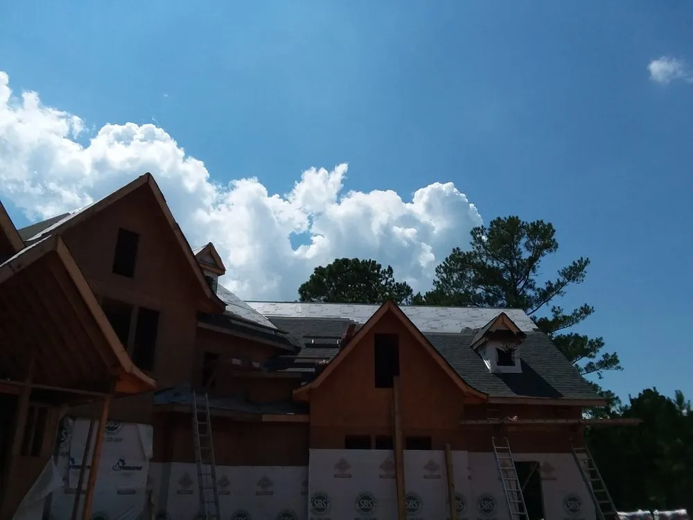 Slide of RJR Roofing