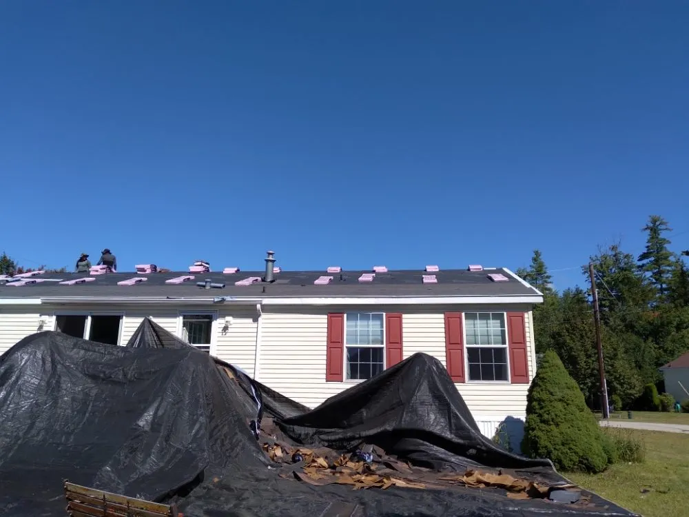 Slide of Rj's Roofing and siding