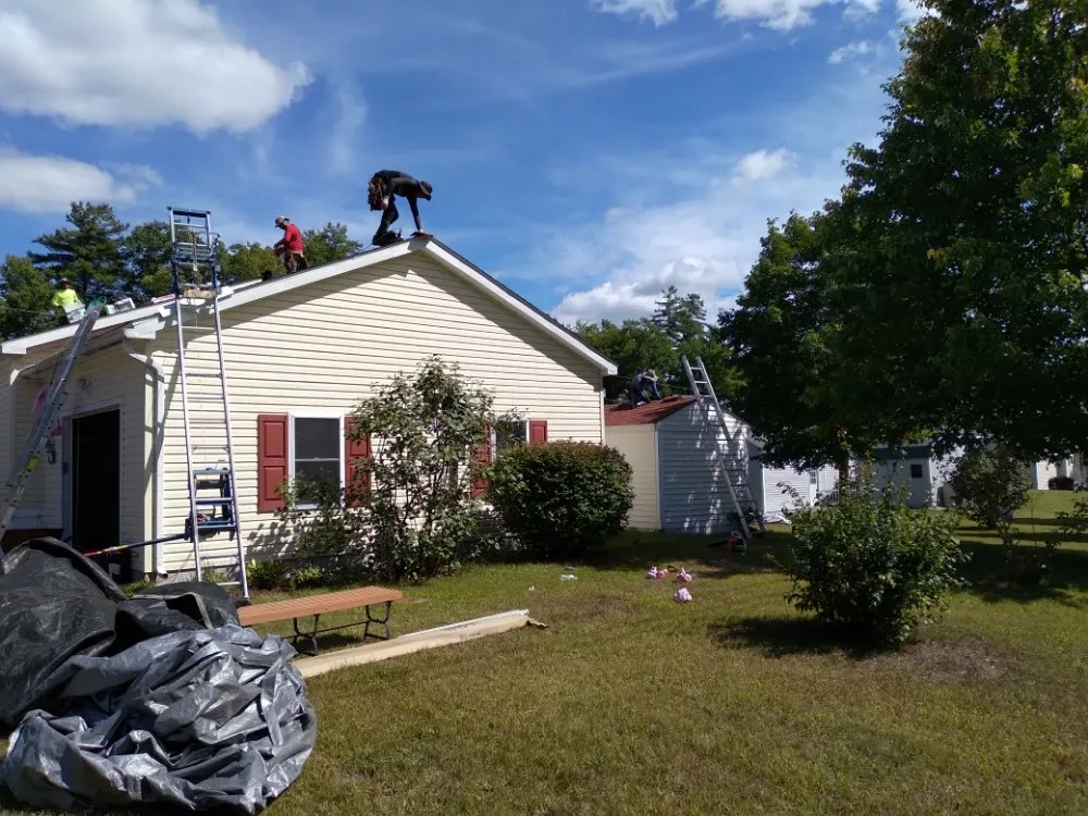 Slide of Rj's Roofing and siding