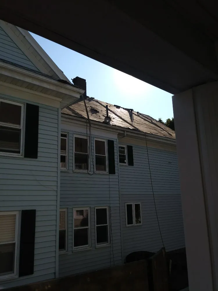 Slide of Rj's Roofing and siding