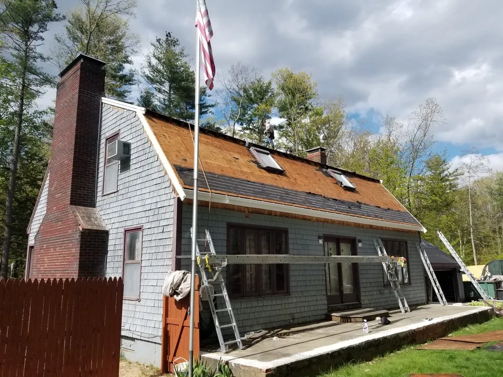 Slide of Rj's Roofing and siding