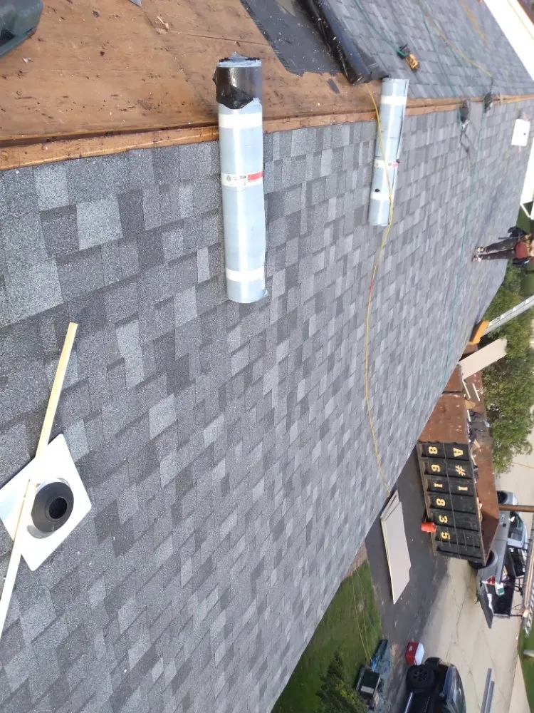 Slide of Rj's Roofing and siding