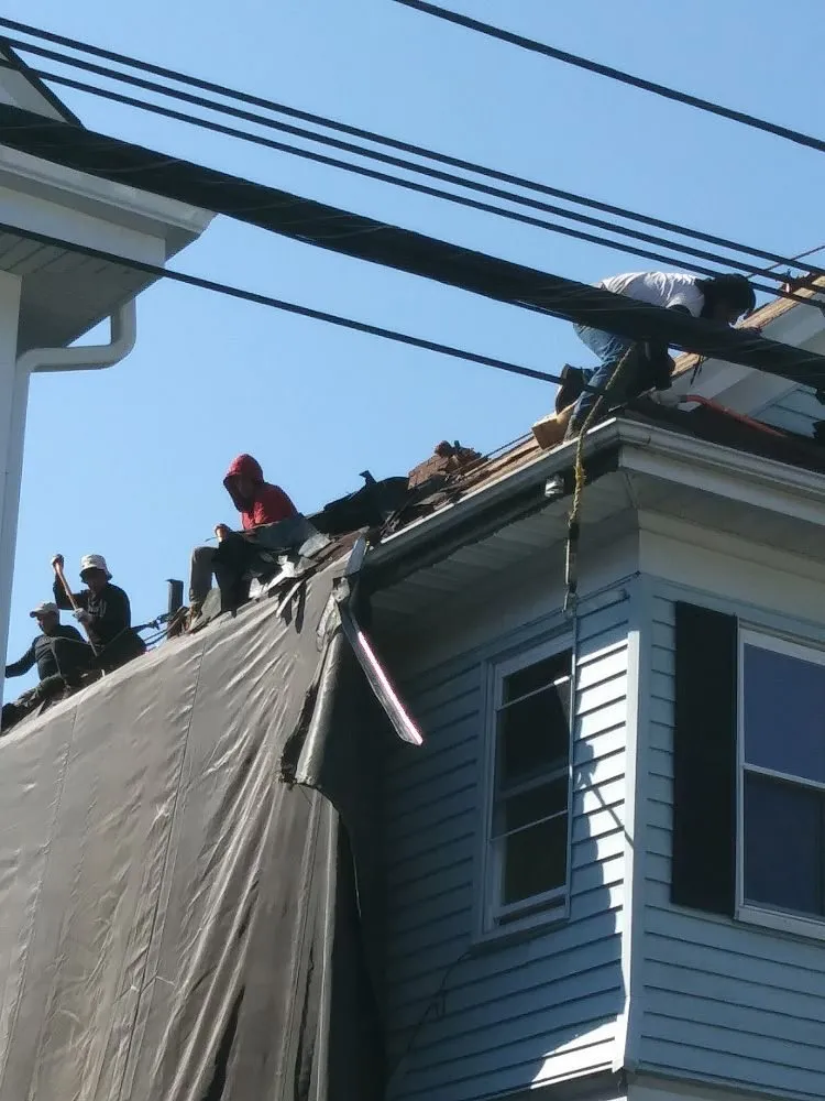 Slide of Rj's Roofing and siding