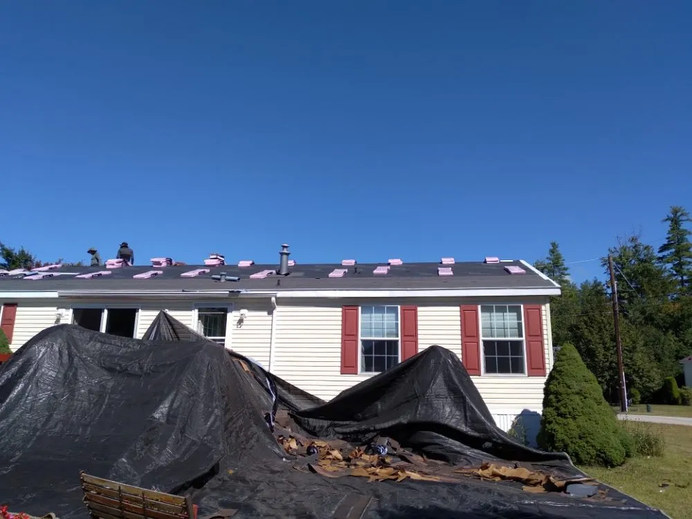 Slide of Rj's Roofing and siding