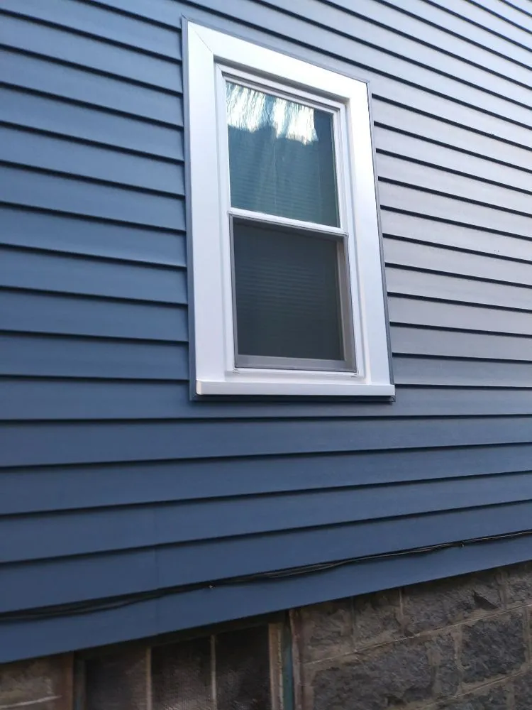 Slide of Rj's Roofing and siding