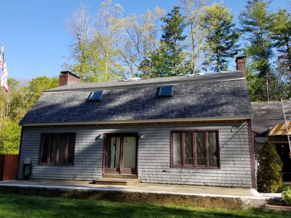 Slide of Rj's Roofing and siding