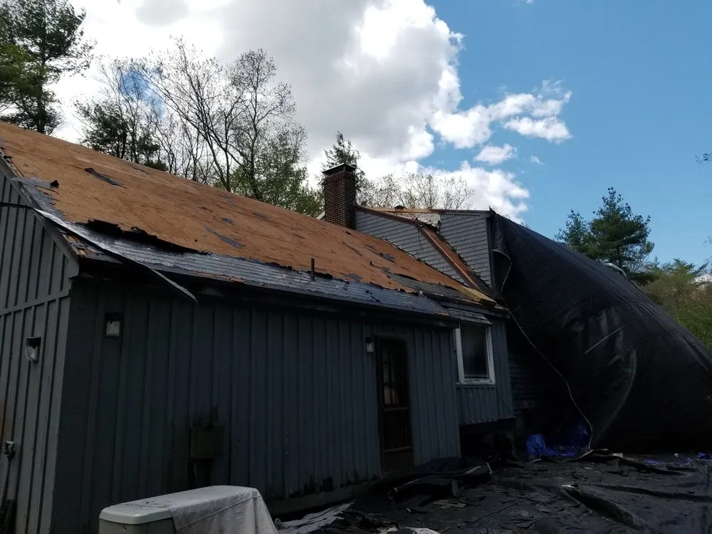 Slide of Rj's Roofing and siding