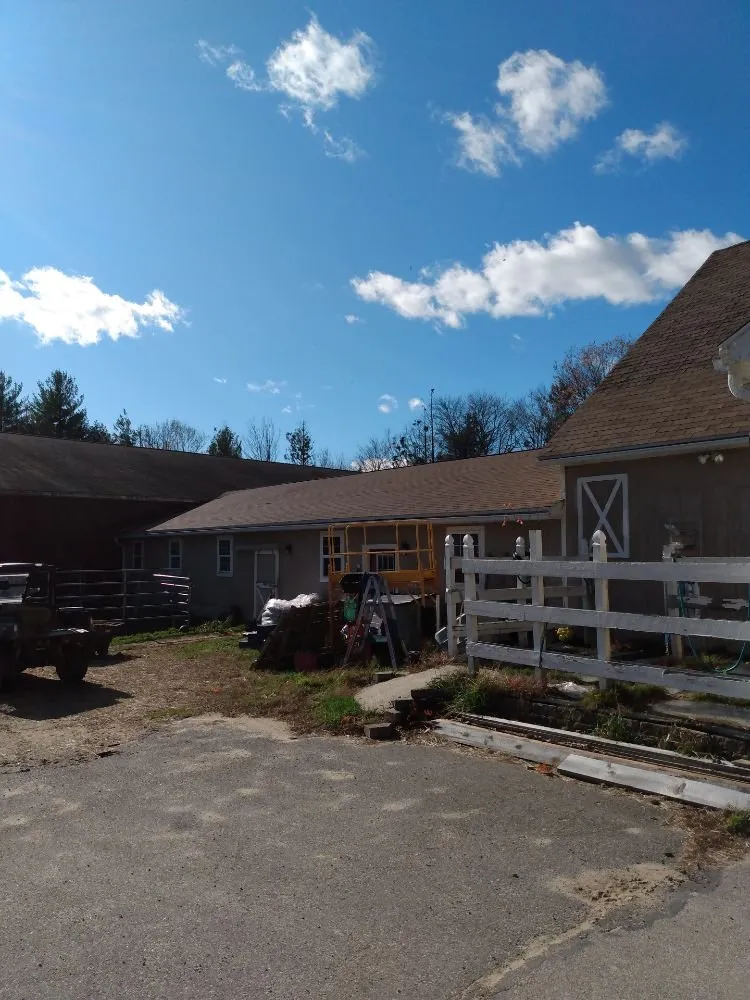 Slide of Rj's Roofing and siding