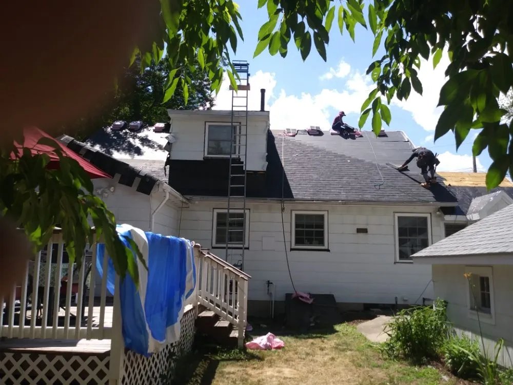 Slide of Rj's Roofing and siding