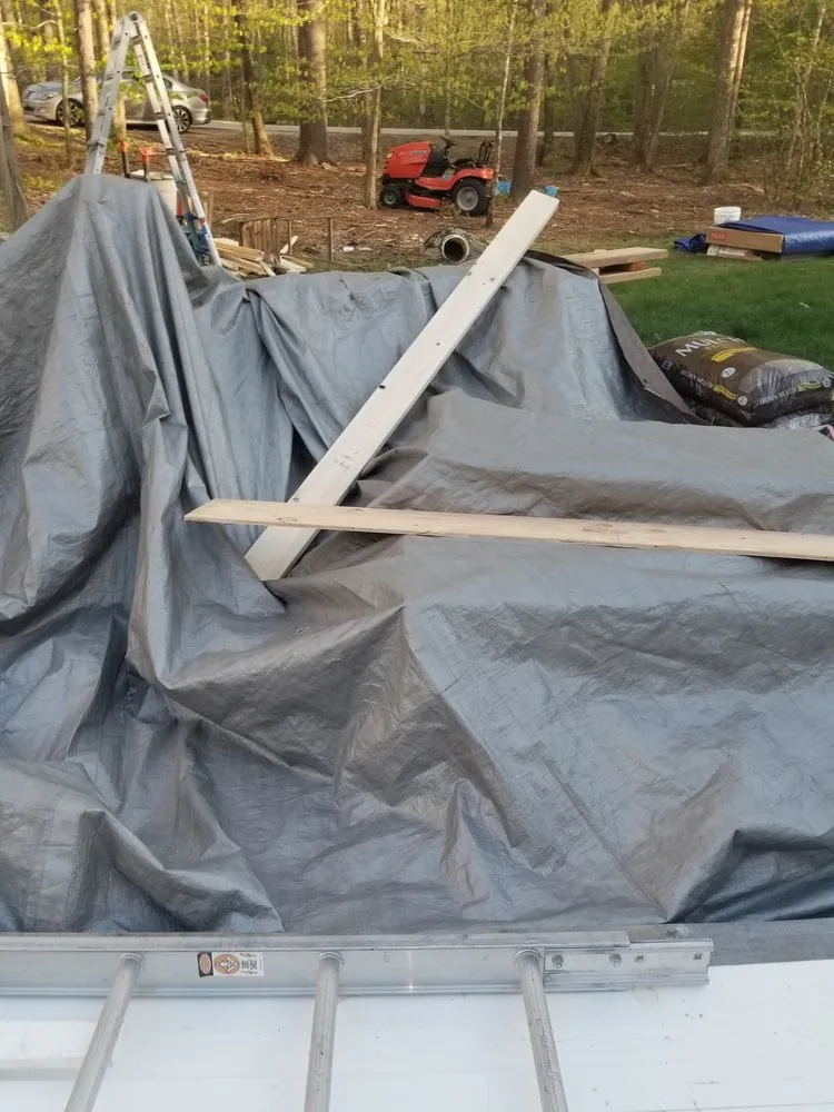 Slide of Rj's Roofing and siding