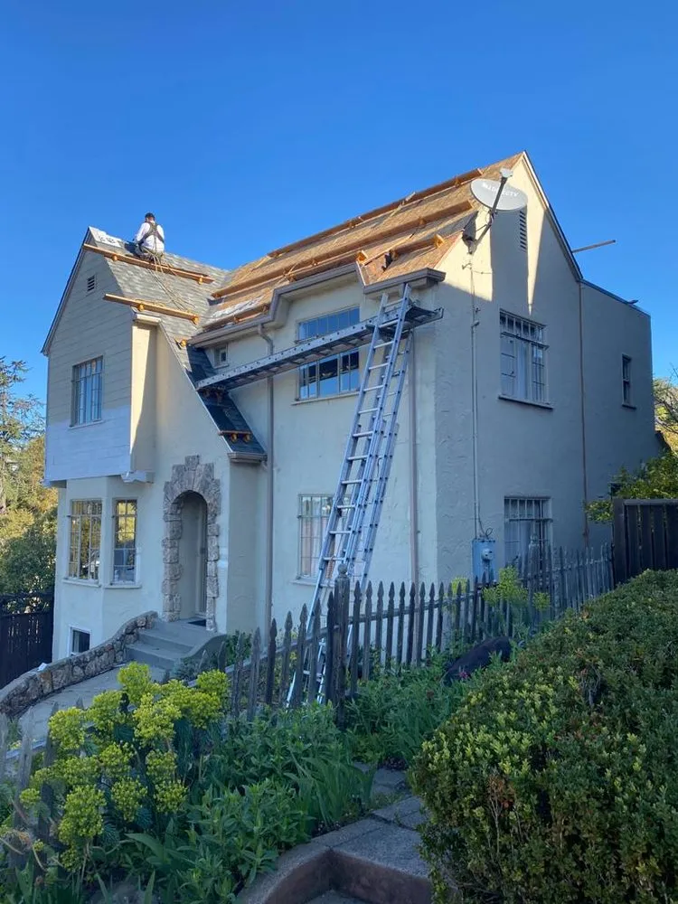 Slide of RK Roofing & Construction