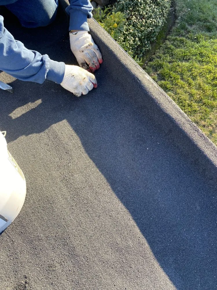 Slide of RK Roofing & Construction