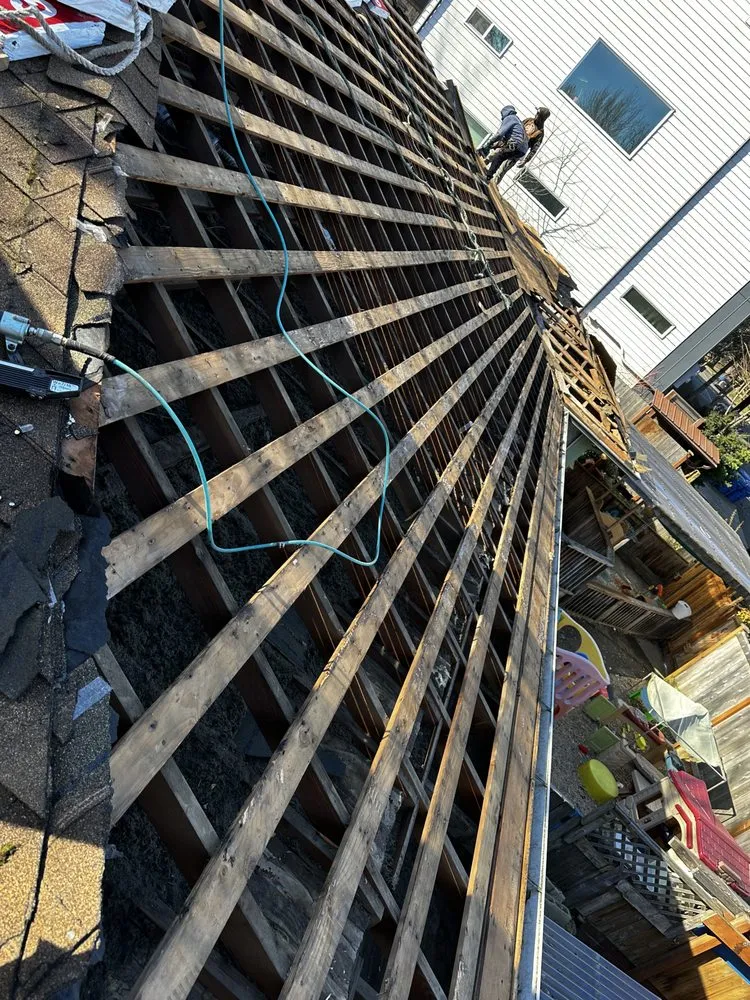 Slide of RM Roofing Contractors