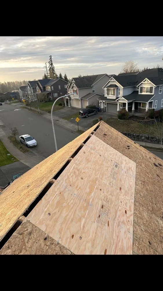 Slide of RM Roofing Contractors