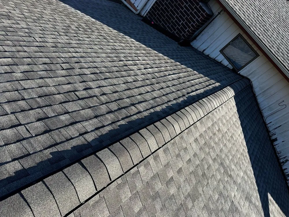 Slide of RM Roofing Contractors