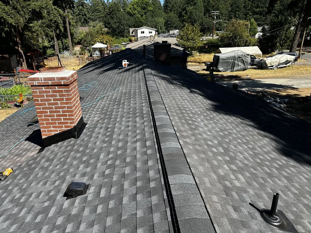 Slide of RM Roofing Contractors