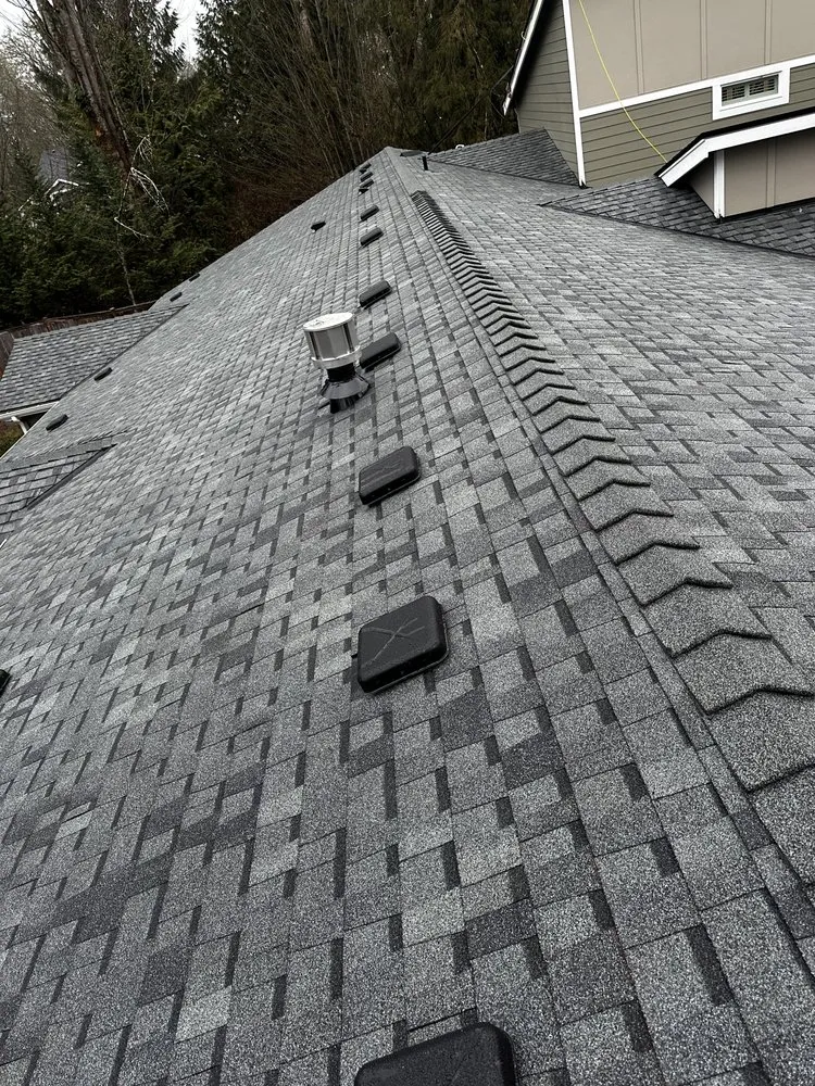 Slide of RM Roofing Contractors