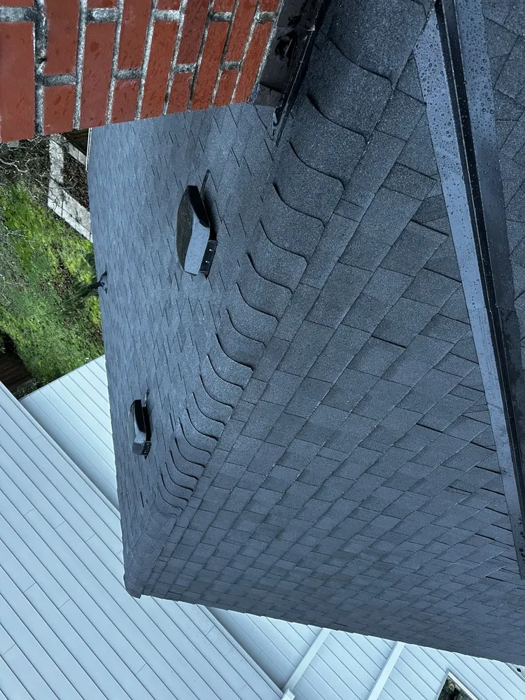 Slide of RM Roofing Contractors