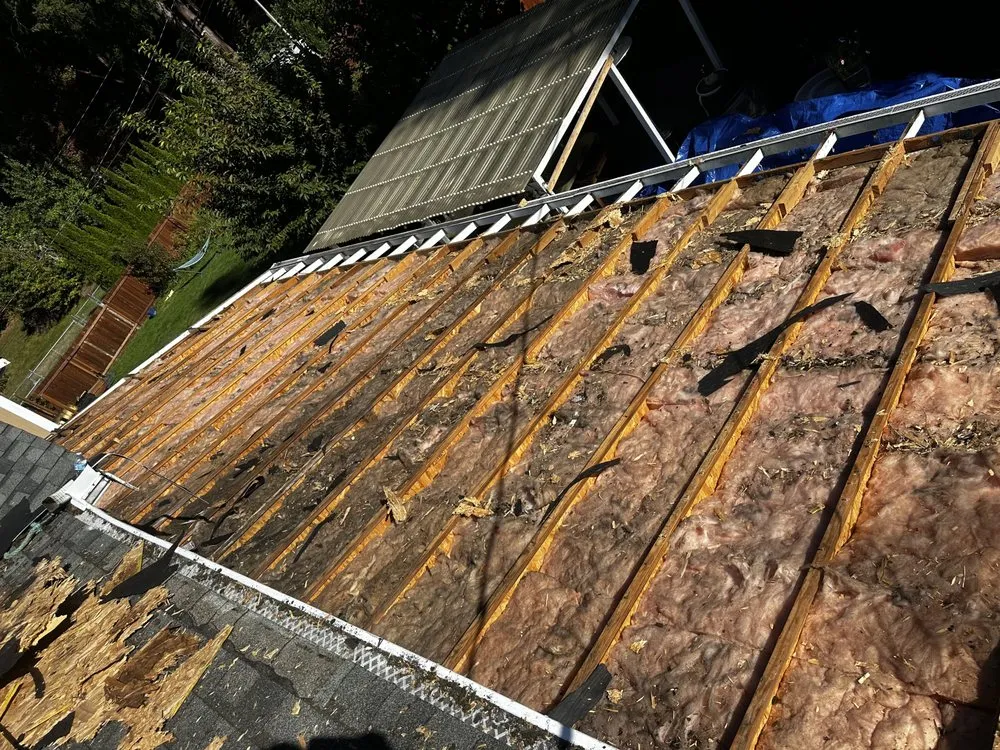 Slide of RM Roofing Contractors