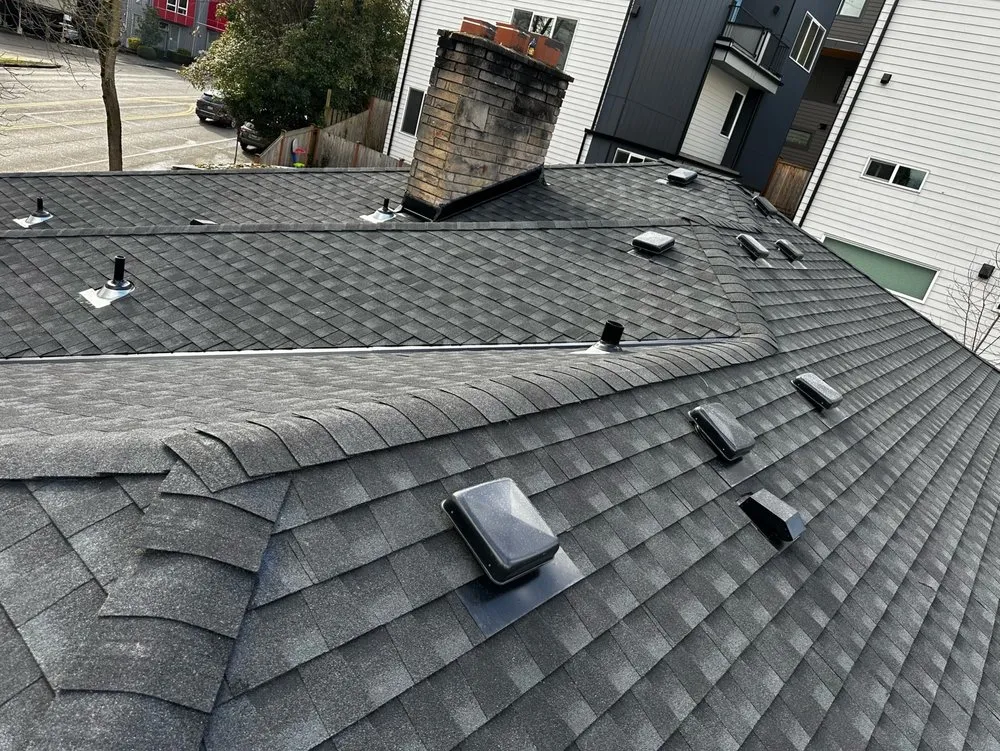 Slide of RM Roofing Contractors