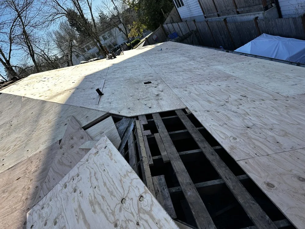 Slide of RM Roofing Contractors