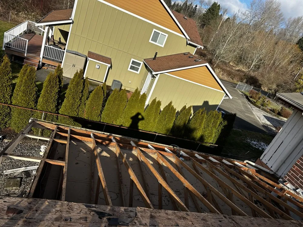 Slide of RM Roofing Contractors