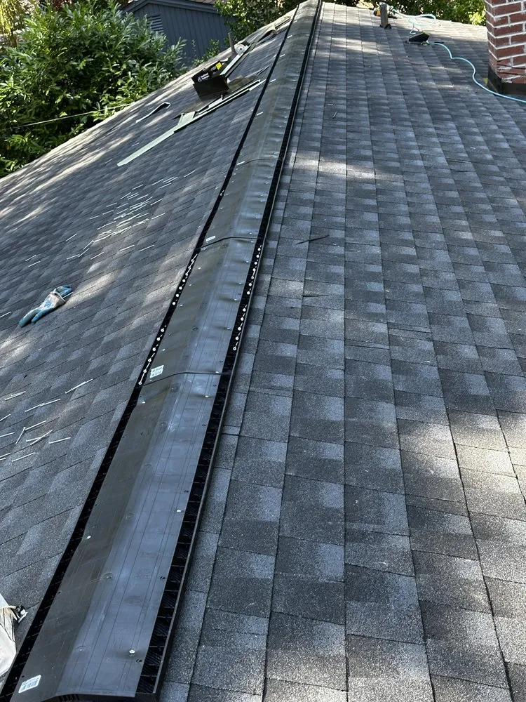 Slide of RM Roofing Contractors