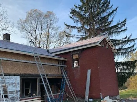 Local roof repair for fast service in East Millsboro, PA by RMD Construction