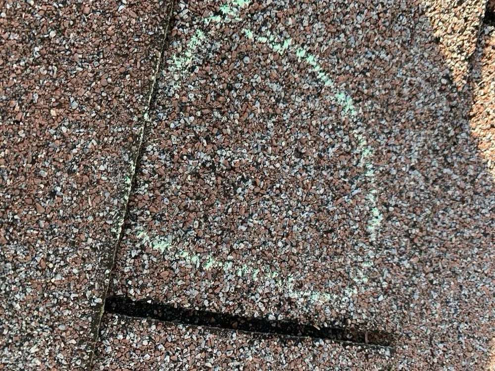 Slide of Roach Roofing