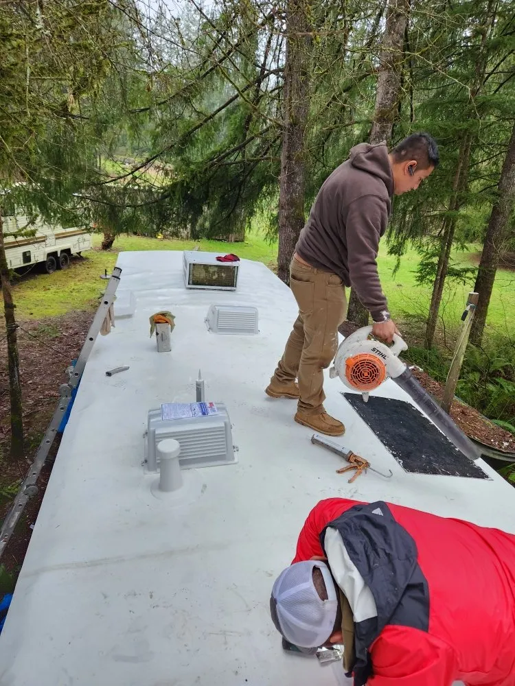 Slide of Road Runner Roofing