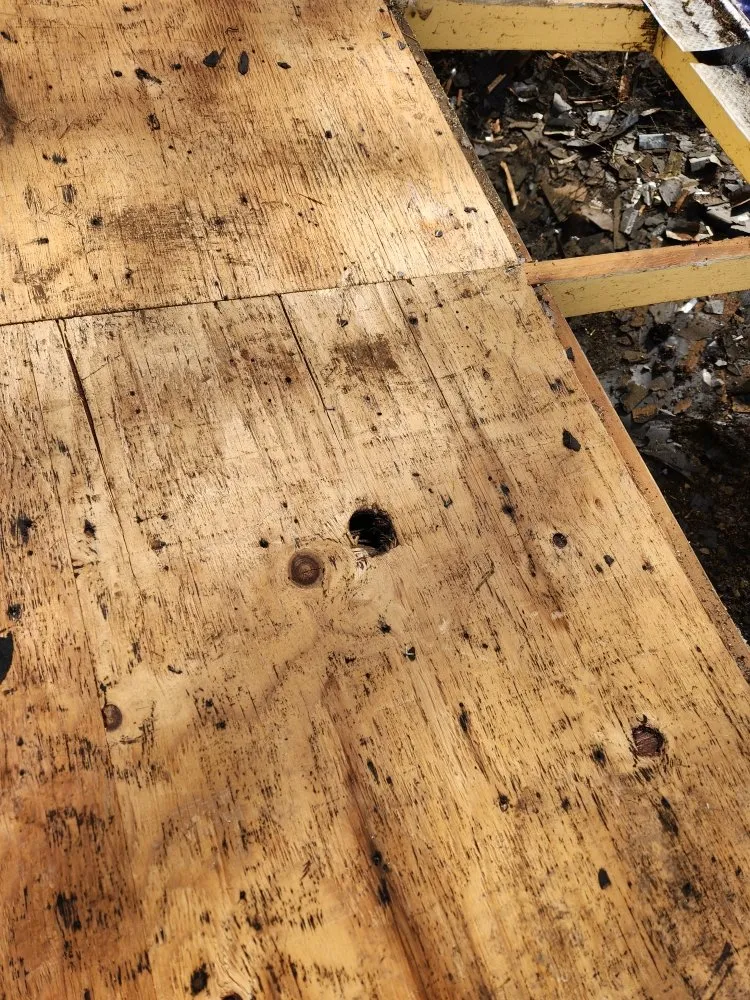 Slide of Road Runner Roofing