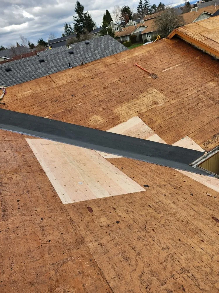 Slide of Road Runner Roofing