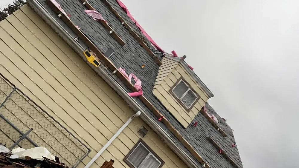 Slide of Road Runner Roofing