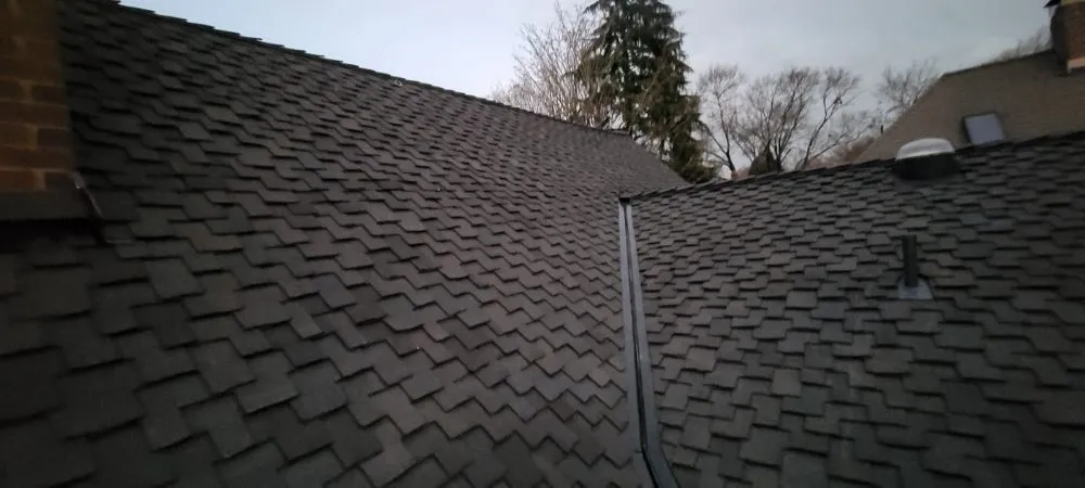 Slide of Road Runner Roofing