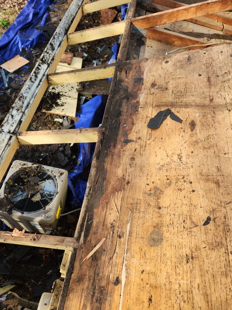 Slide of Road Runner Roofing